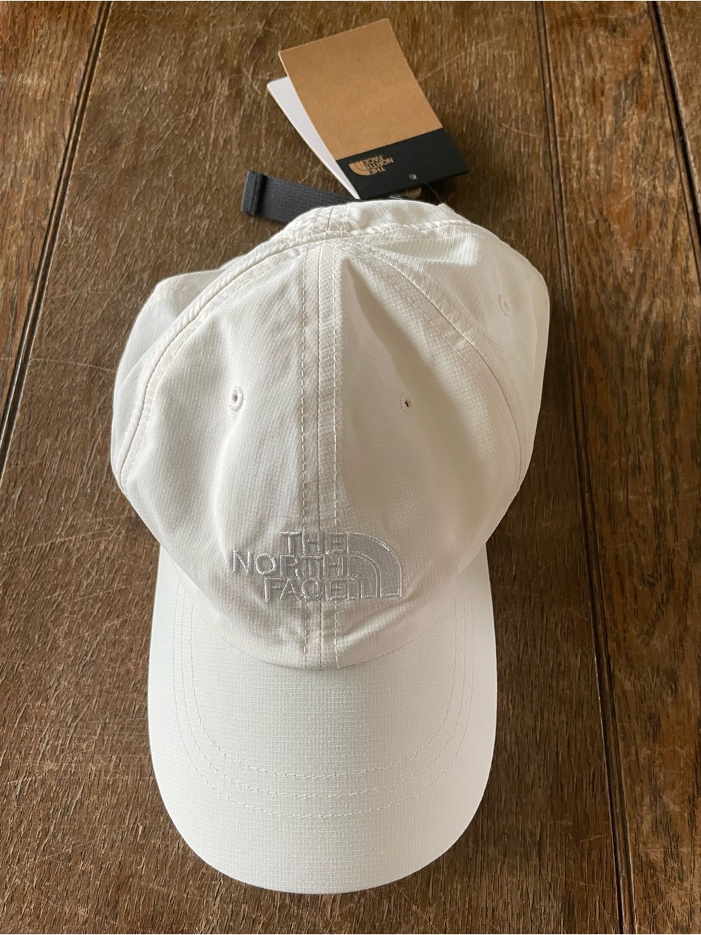 The North Face White Horizon Cap with Black Drawcord